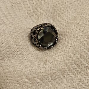 Elegant Silver Ring with Dark Gemstone
